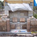 Decorative facade on Greg's wood burning brick oven.