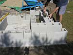 Filling the thin blocks with concrete.