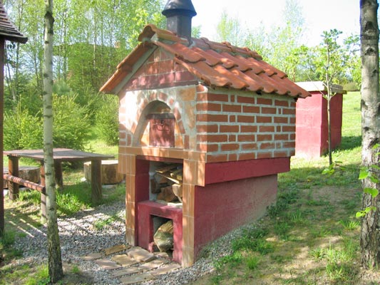 What are some plans for a wooden smokehouse?