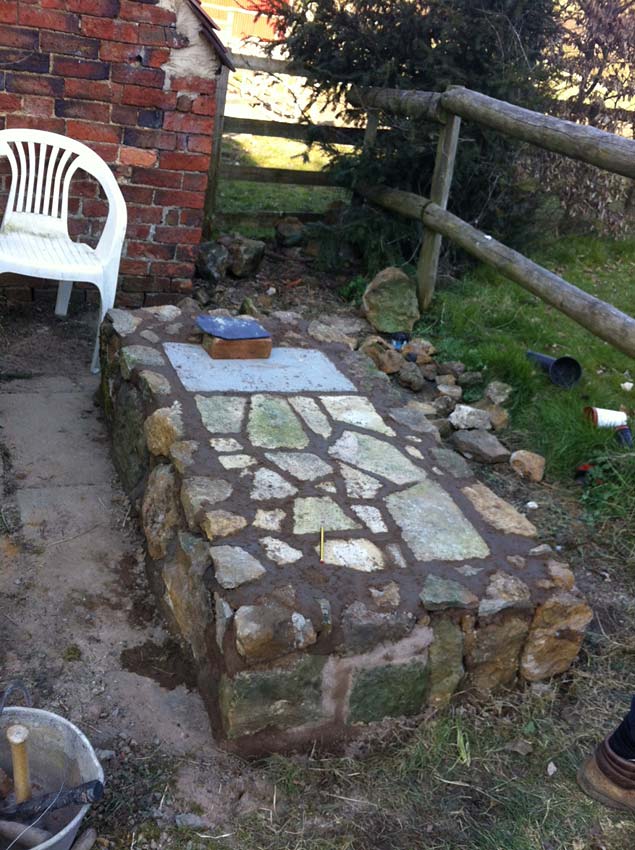 Brick oven with stone base