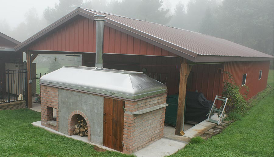 Pizza oven with fireplace and smoker
