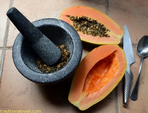 Making papaya seed drink remedy.