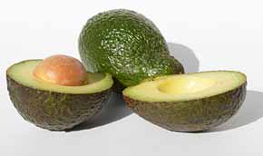 Hass avocados raw California, cross-section of one.