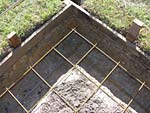 Corner view on steel reinforcing, metal bars and mesh.