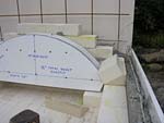 Making masterly tail oven firebrick arches.