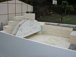 Making masterly tail oven firebrick arches.