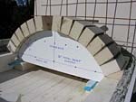 Making masterly tail oven firebrick arches.