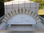 Making masterly tail oven firebrick arches.