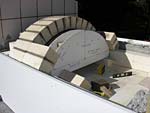 Making masterly tail oven firebrick arches.