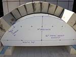 Making masterly tail oven firebrick arches.