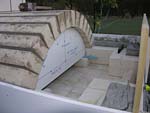 Making masterly tail oven firebrick arches.