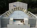 Making masterly tail oven firebrick arches.