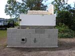 Finishing firebrick work with oven entrance.