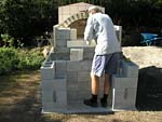 Finishing firebrick work with oven entrance.