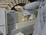 Finishing firebrick work with oven entrance.