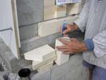 Finishing firebrick work with oven entrance.