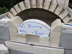 Finishing firebrick work with oven entrance.