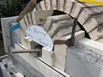 Finishing firebrick work with oven entrance.