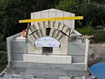 Finishing firebrick work with oven entrance.
