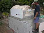Finishing firebrick work with oven entrance.