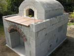 Making flue hood with own arch and front arched decoration.