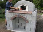Making flue hood with own arch and front arched decoration.