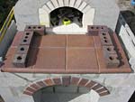 Making flue hood with own arch and front arched decoration.