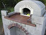 Making flue hood with own arch and front arched decoration.