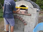 Making flue hood with own arch and front arched decoration.