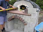 Making flue hood with own arch and front arched decoration.