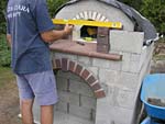 Making flue hood with own arch and front arched decoration.