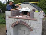 Making flue hood with own arch and front arched decoration.