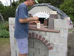Making flue hood with own arch and front arched decoration.