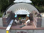 Making flue hood with own arch and front arched decoration.