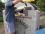 Making flue hood with own arch and front arched decoration.