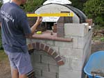 Making flue hood with own arch and front arched decoration.