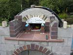 Making flue hood with own arch and front arched decoration.