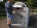 Making flue hood with own arch and front arched decoration.