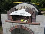 Making flue hood with own arch and front arched decoration.