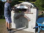 Making flue hood with own arch and front arched decoration.