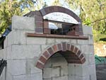 Making flue hood with own arch and front arched decoration.
