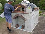 Making flue hood with own arch and front arched decoration.