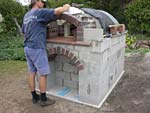 Making flue hood with own arch and front arched decoration.
