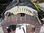 Making flue hood with own arch and front arched decoration.