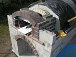 Making flue hood with own arch and front arched decoration.