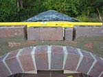 Making flue hood with own arch and front arched decoration.