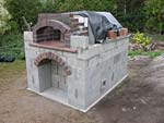 Making flue hood with own arch and front arched decoration.