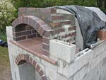 Making flue hood with own arch and front arched decoration.