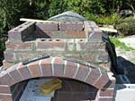 Making flue hood with own arch and front arched decoration.
