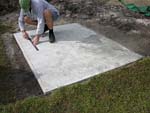 Raising block walls with dry stack cement blocks filled with concrete.
